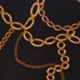 Black & Gold Chain Print Faux Wrap Jersey Top